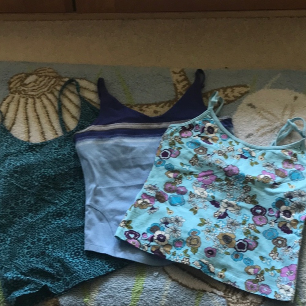 Lot of three tank tops, two Patagonia, solid is The North Face, left(medium)